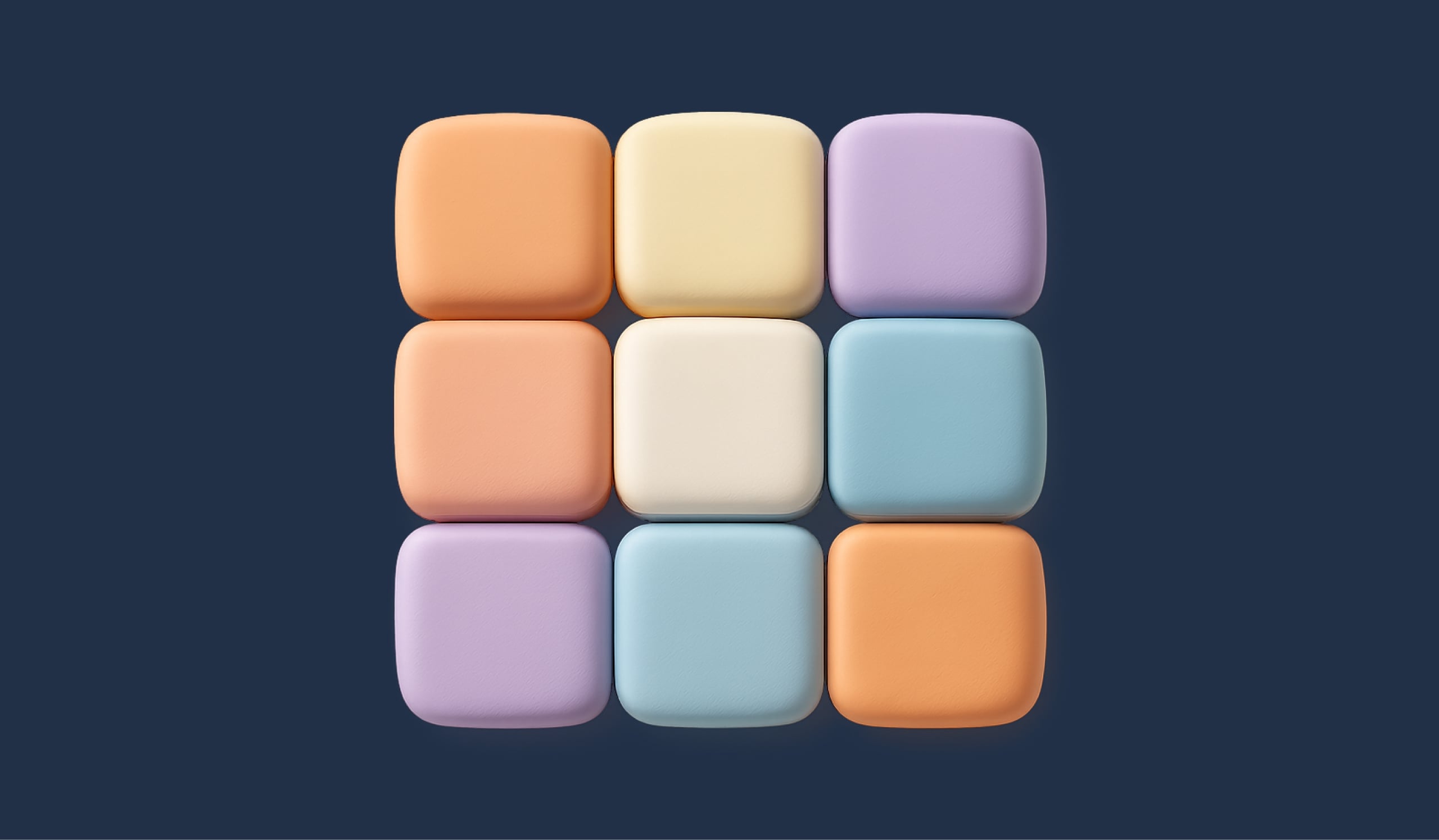 Grid of pastel rounded cubes on a navy backdrop