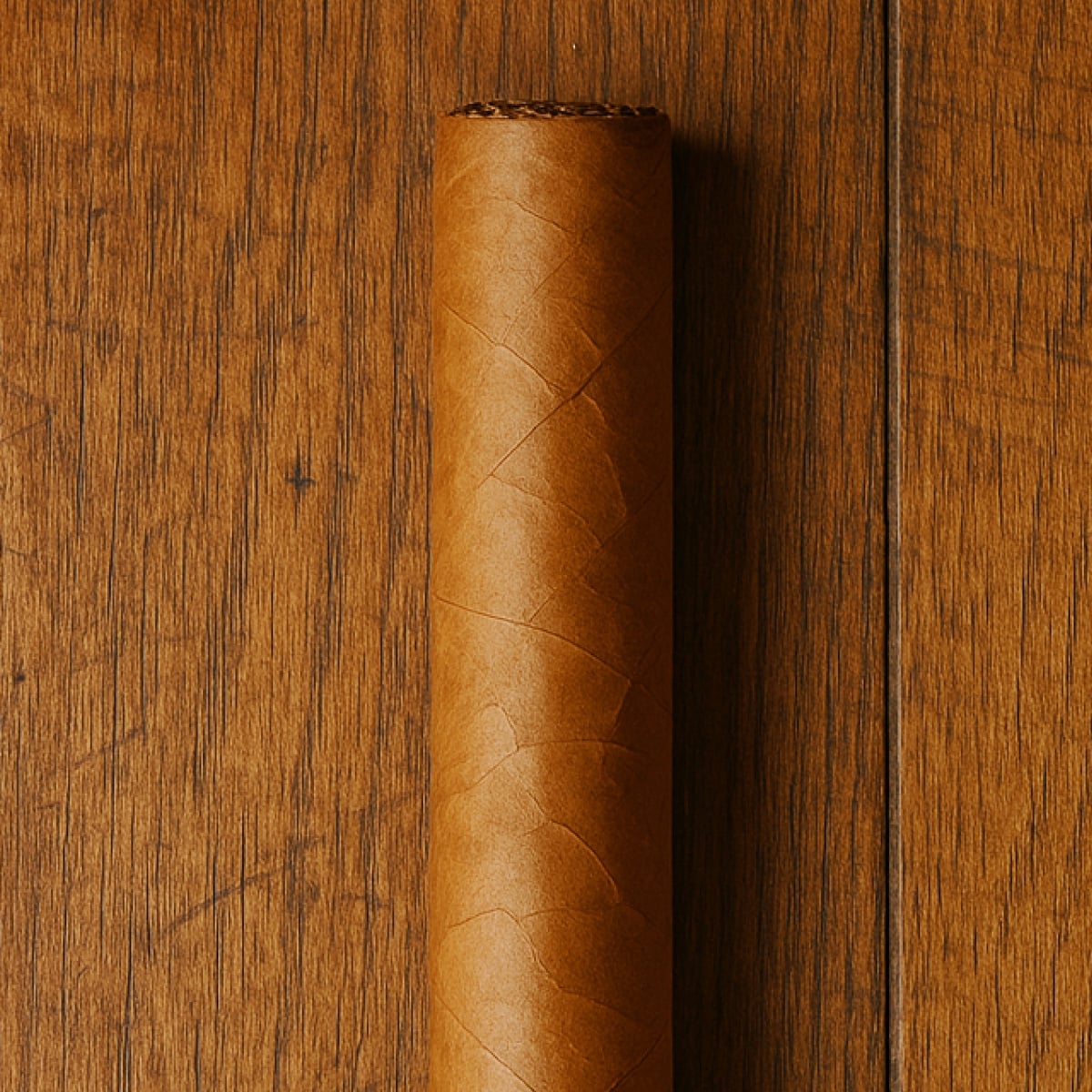 Moody still life of aged tobacco leaves and heritage packaging
